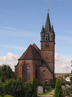 Das Foto basiert auf dem Bild "Stadtkirche St. Martin (1414)" aus dem zentralen Medienarchiv Wikimedia Commons und steht unter der GNU-Lizenz für freie Dokumentation. Der Urheber des Bildes ist Janspengler.